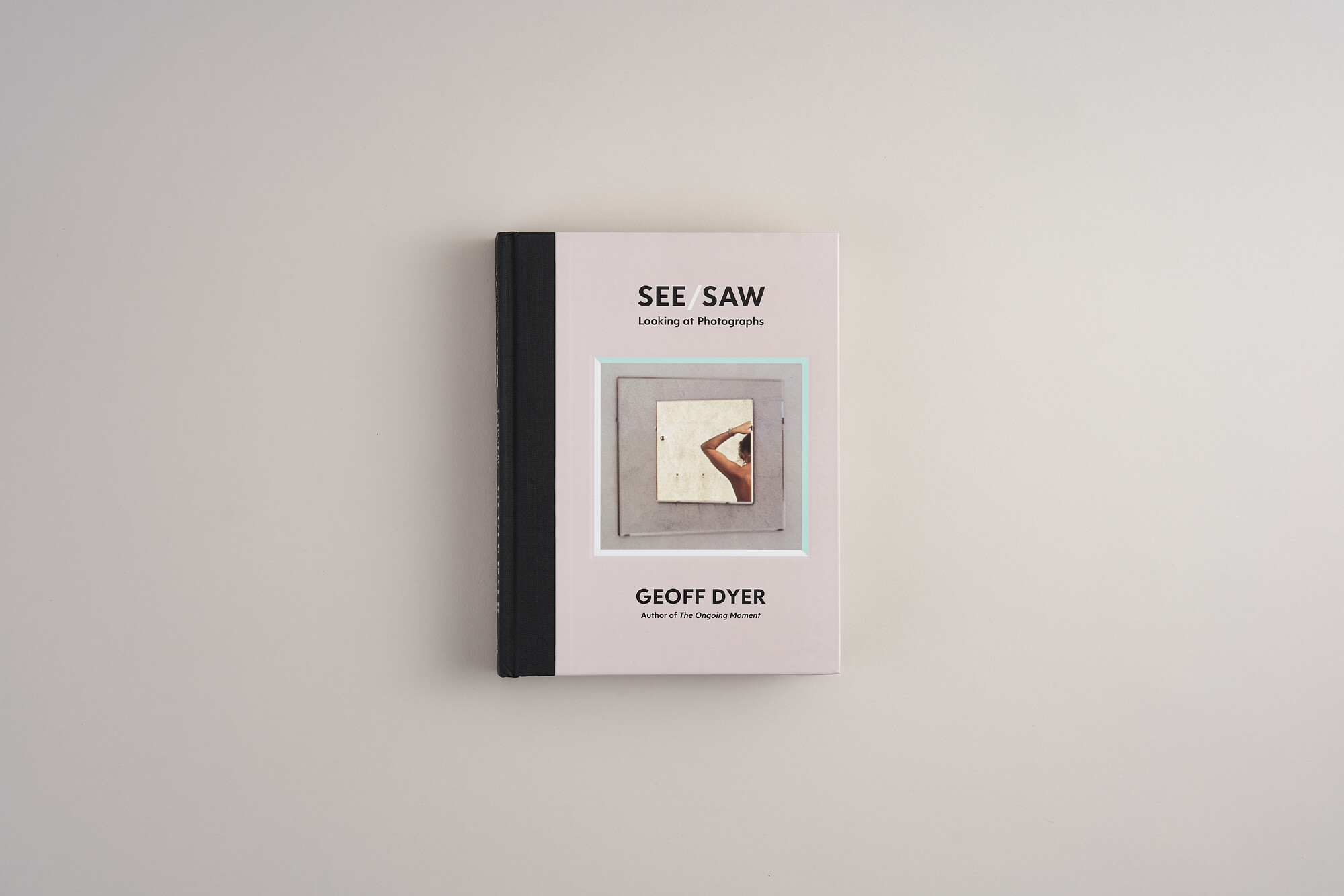 See/Saw by Geoff Dyer. Photographed on a plain background.